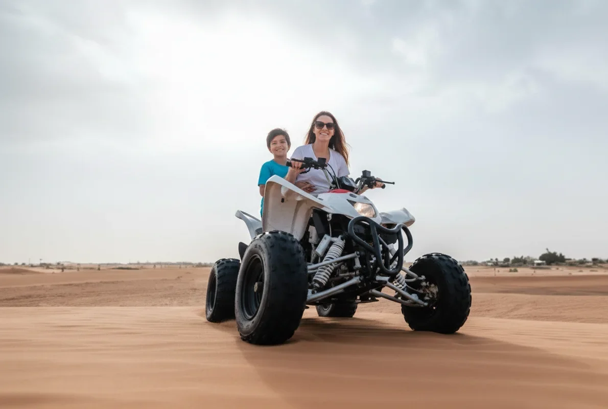 Family riding quad bikes together in Dubai desert