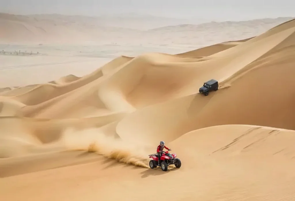 New rider following a guide on a gentle desert trail