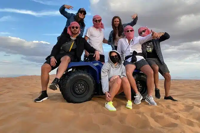 Beginner rider operating a quad bike inside a supervised desert riding zone