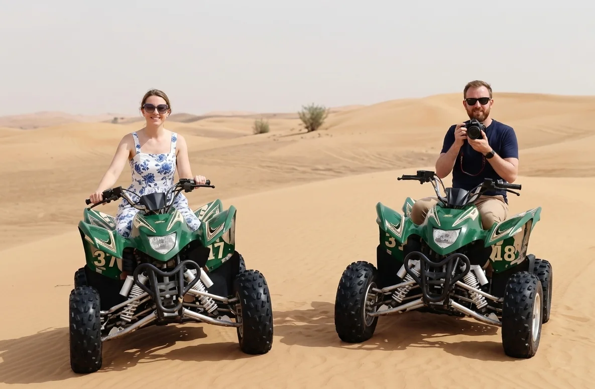 Rider navigating a quad bike across the red sand dunes of Dubai desert during a guided morning adventure under clear skies safely