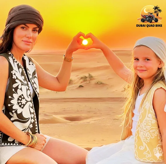 Rider driving quad bike across Dubai desert dunes during sunset with golden sand, clear sky and soft wind creating a peaceful and thrilling view