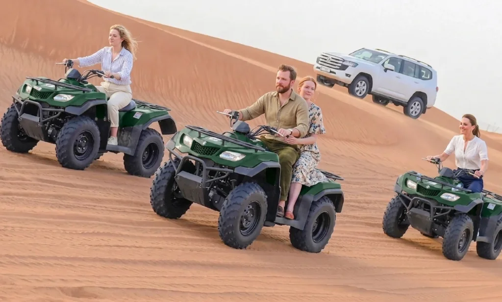 Self drive quad bike rental Dubai riding across red dunes in desert adventure tour